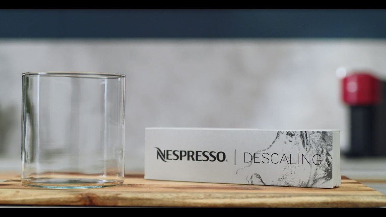 how to get nespresso vertuo out of descaling mode